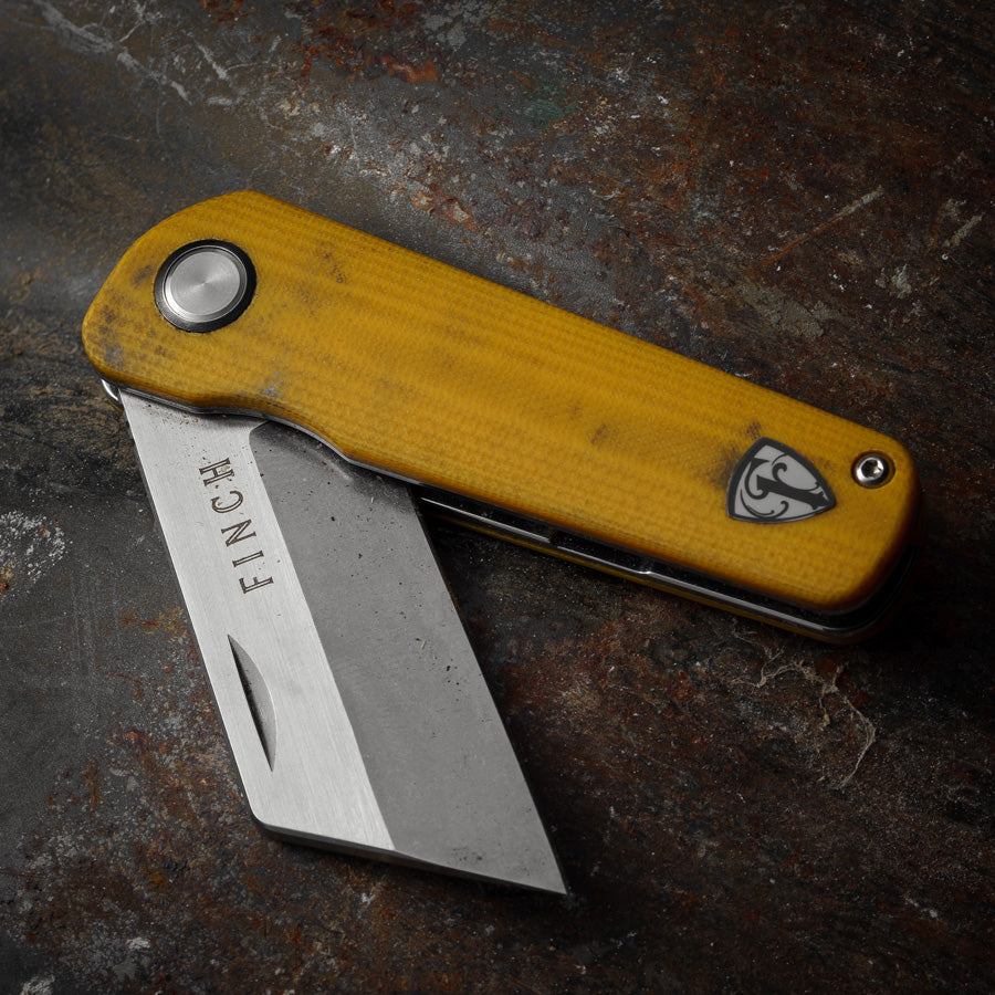 The Runtly folding knife in yellow