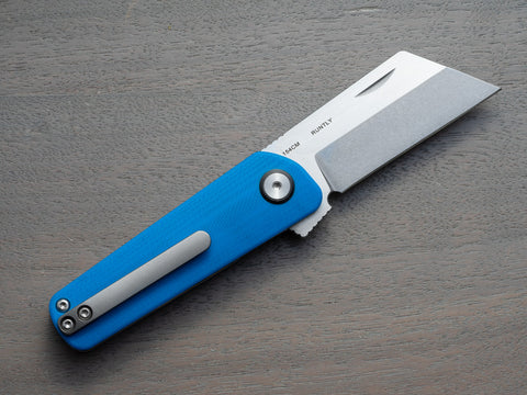A RUNTLY pocket knife with blue handle