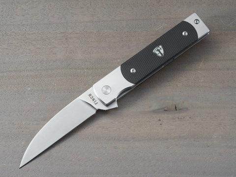 Holliday pocket knife with wharncliffe blade and black linen micarta handle