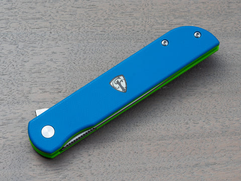 Cimarron folding knife with blue & green handle