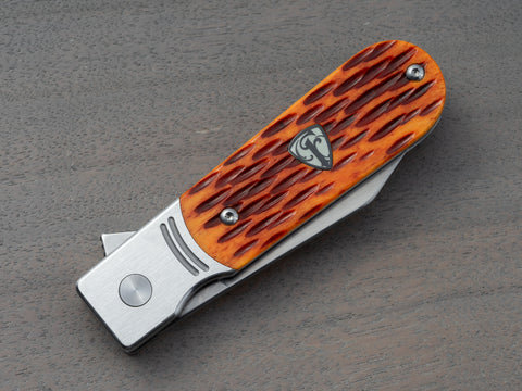 Closeup of Finch 1929 pocket knife with jigged bone handle