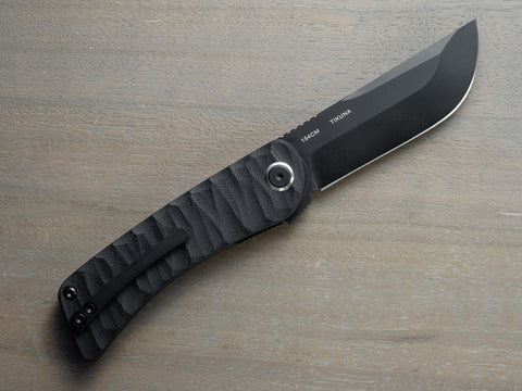 Pocket knife with black handle and black blade