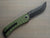 Tikuna with black blade and green handle