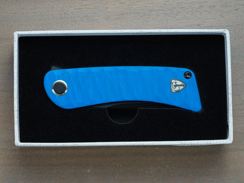 Finch Tikuna knife with blue handle inside box